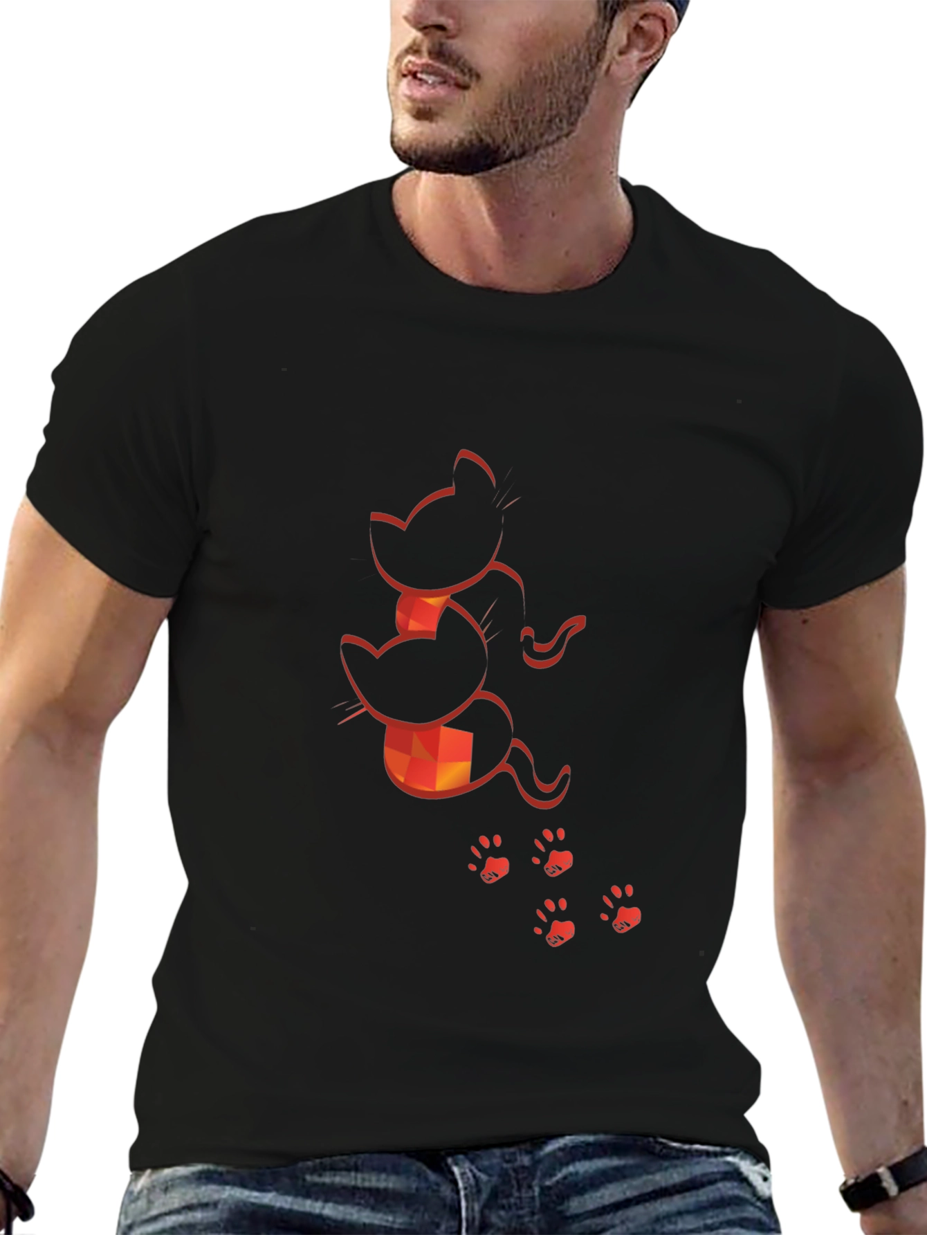 Camiseta Negra con Diseño de Gatos Naranja